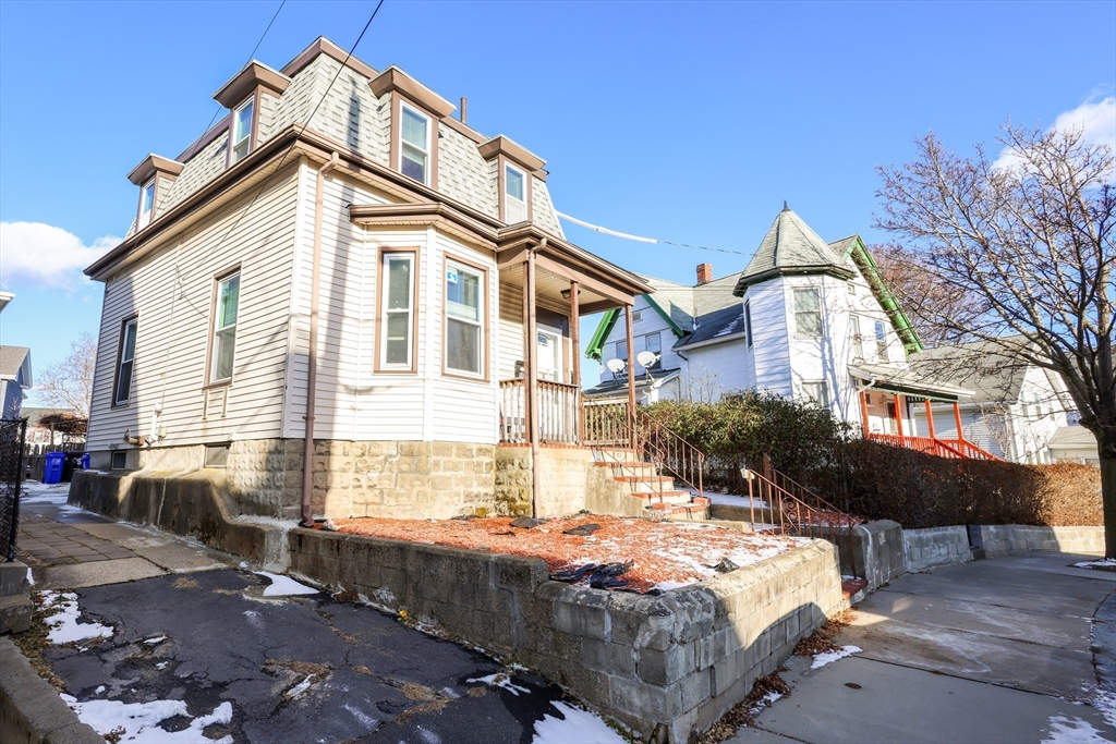 68 Newhall Street, Unit 68 Malden, MA 02148 - Photo 6 of 39 a view of a house with a yard