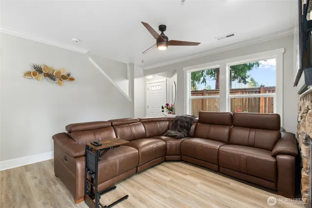 a living room with furniture and a window