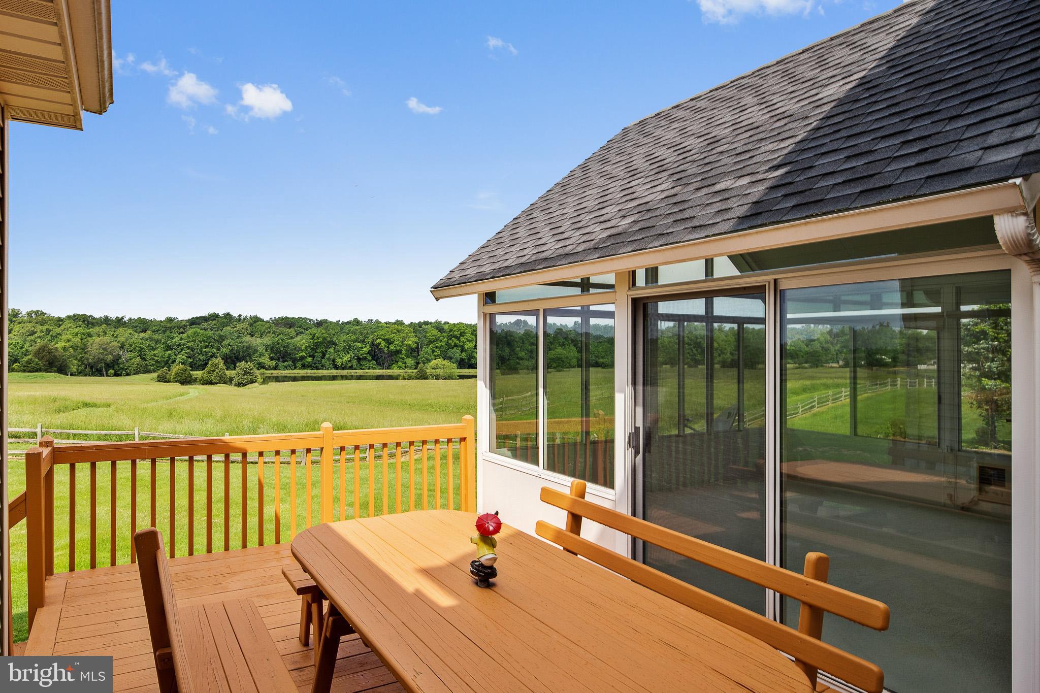 115 Scott Road Warwick, MD 21912 - Photo 21 of 43 View of back deck and sunroom into open space