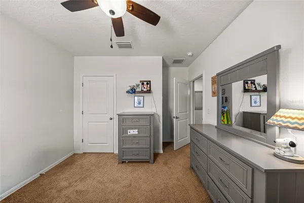 a view of a bedroom and bathroom