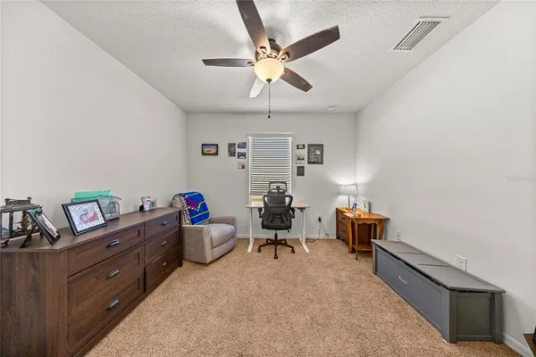 a view of room with furniture and closet