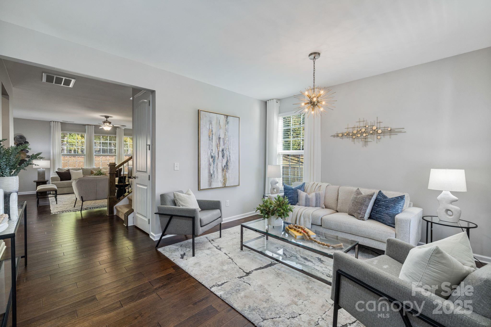 232 Morgan's Branch Road Belmont, NC 28012 - Photo 14 of 40 a living room with furniture and wooden floor