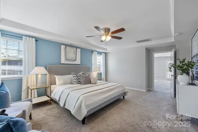 a kitchen with granite countertop cabinets and black stainless steel appliances