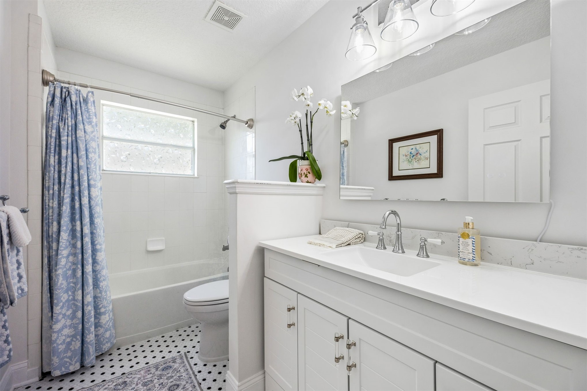 86107 Remsenburg Drive Fernandina Beach, FL 32034 - Photo 20 of 58 a bathroom with a sink a toilet and shower