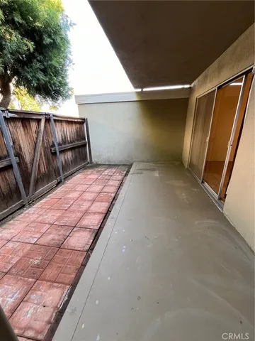 a balcony with wooden floor