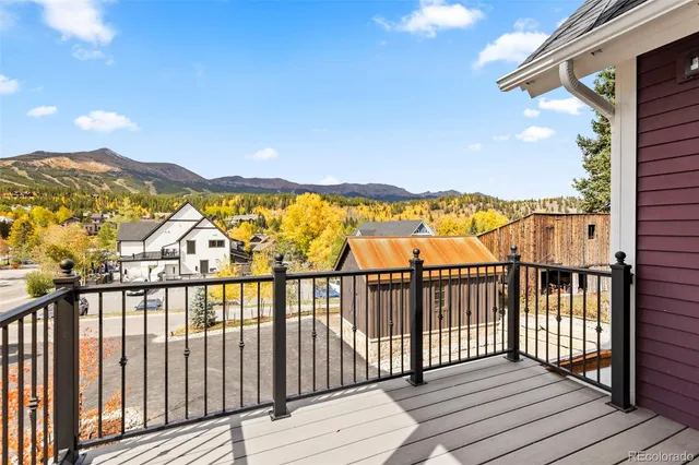 a view of a chairs and table in patio
