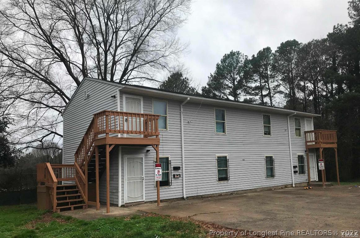 630 Middle Street, Unit 2 Durham, NC 27703 - Photo 1 of 5 a front view of a house with garden