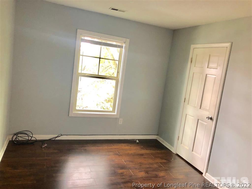 630 Middle Street, Unit 2 Durham, NC 27703 - Photo 3 of 5 a view of an empty room and window
