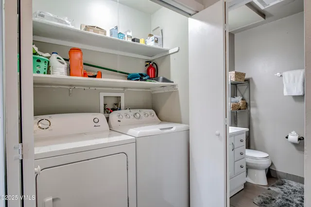 a utility room with dryer and washer