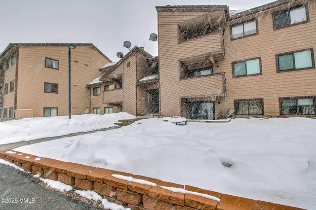 a view of a building with a road
