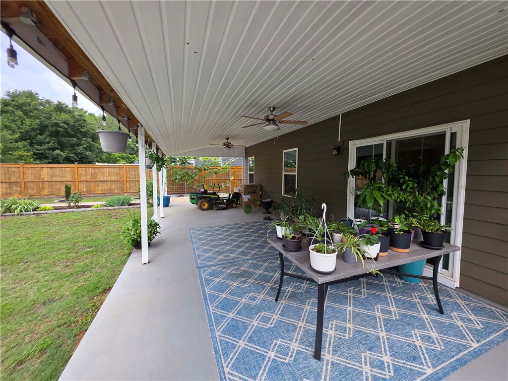 224 Bronson Ridge Anderson, SC 29621 - Photo 25 of 42 An inviting covered patio overlooks a private, fenced backyard.