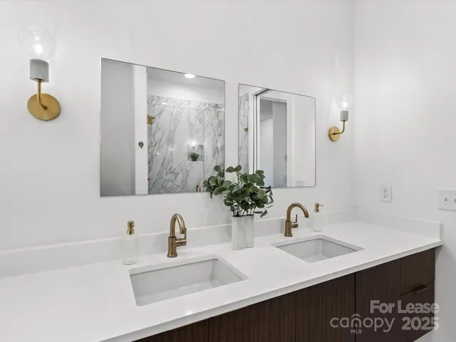 a work room with furniture and a painting on the wall