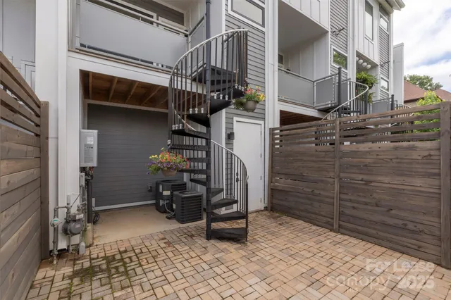 a view of outdoor space and wooden deck