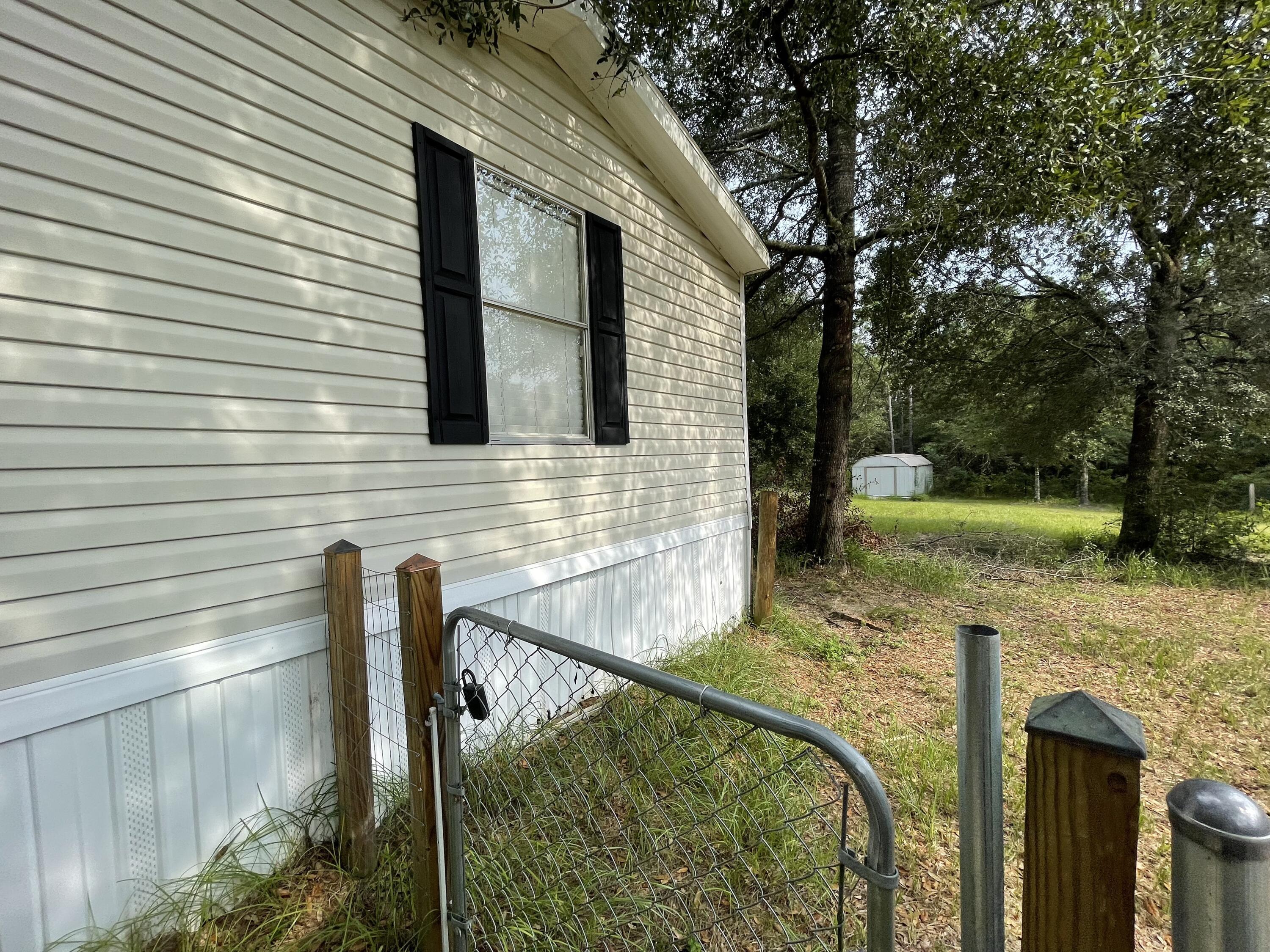 4610 Wilkerson Bluff Road Holt, FL 32564 - Photo 7 of 27 IMG_5573