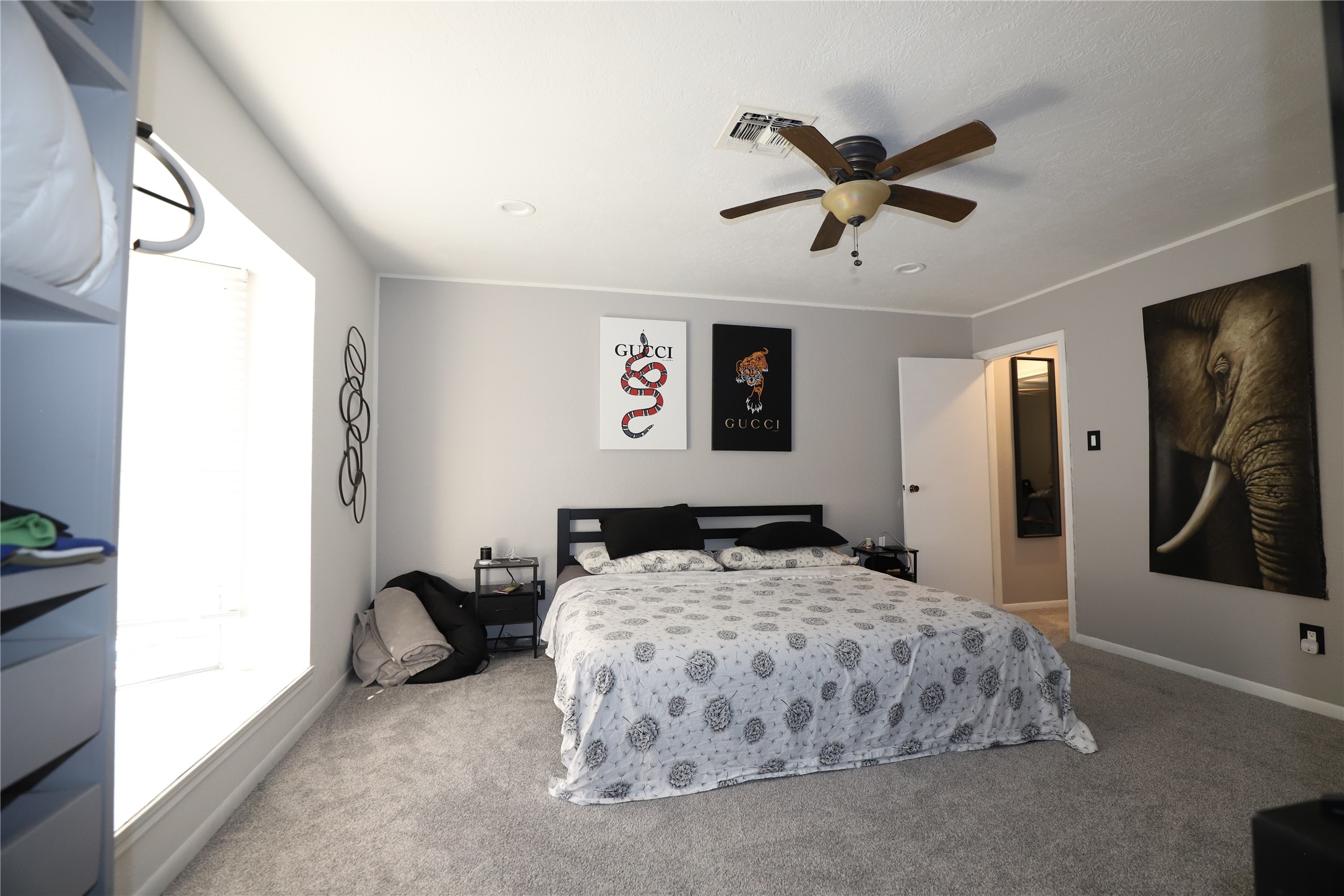 2103 Place Rebecca Lane, Unit D6 Houston, TX 77090 - Photo 14 of 31 a bedroom with a bed and window