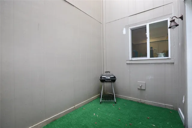 a small room with a table and a chair