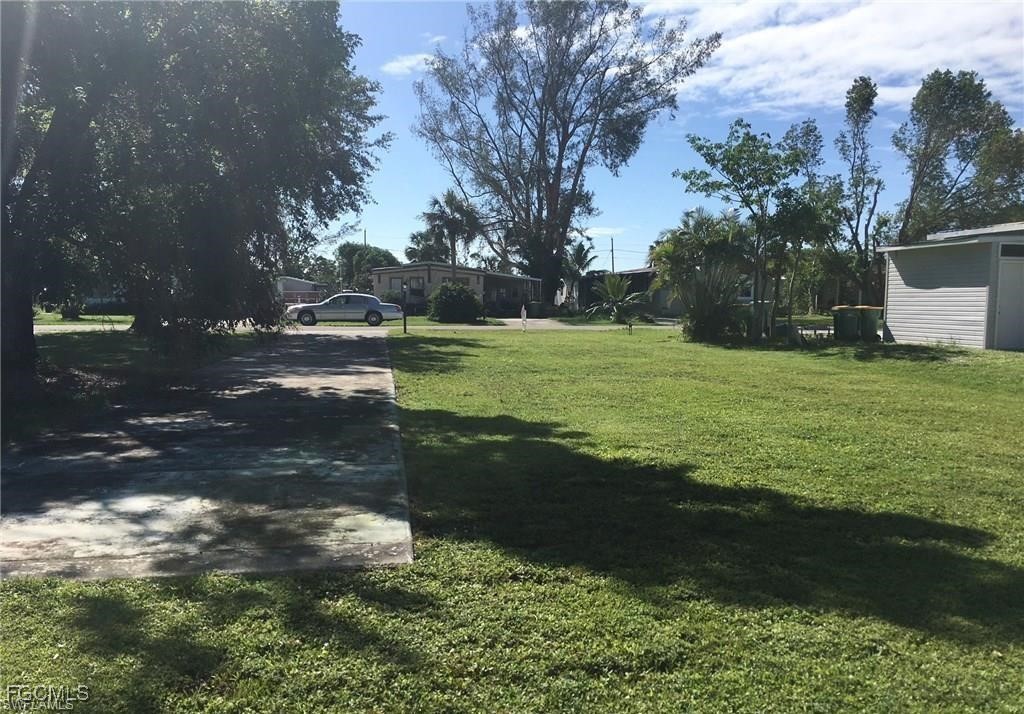171 Pine Key Lane Naples, FL 34114 - Photo 3 of 8 a view of an outdoor space