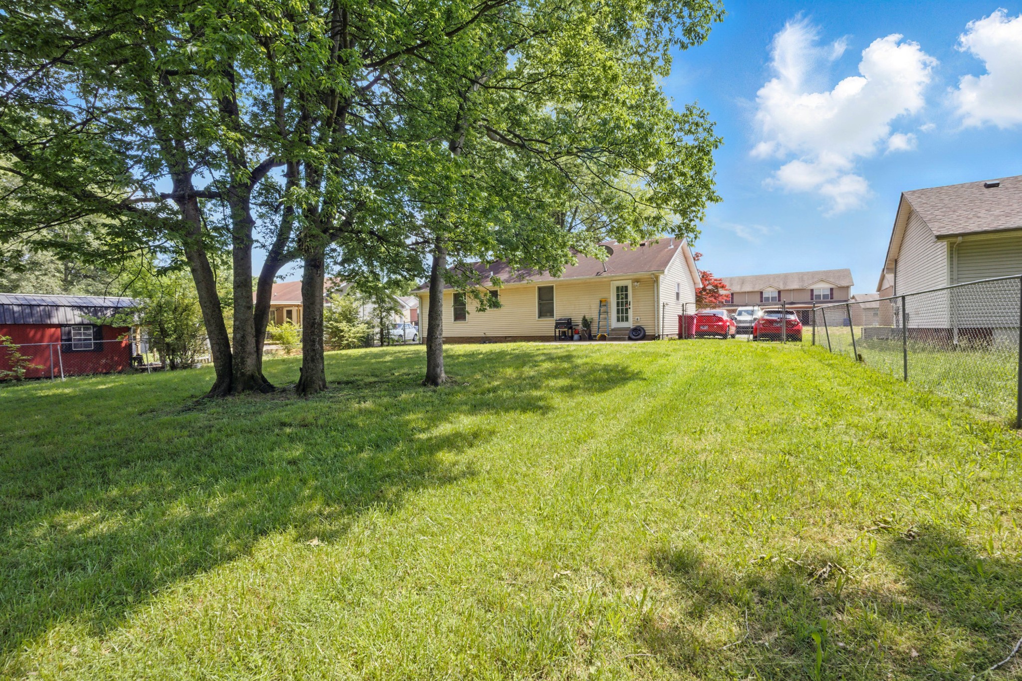 763 Needmore Road Clarksville, TN 37040 - Photo 22 of 43 a view of a tree in front of a house