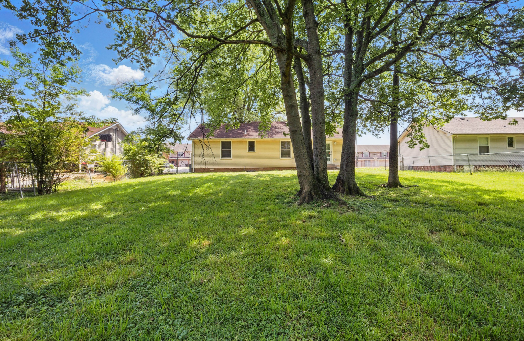 763 Needmore Road Clarksville, TN 37040 - Photo 24 of 43 a view of backyard with huge green area and large trees