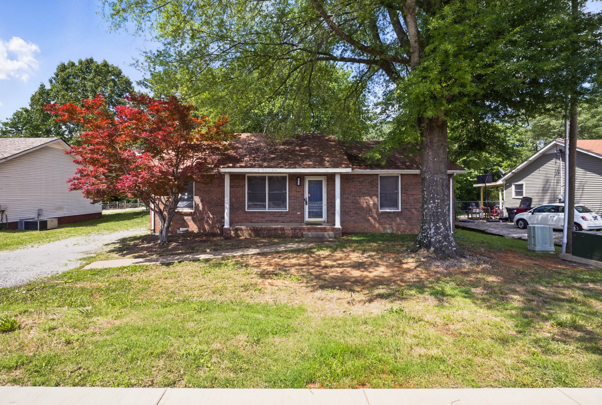 763 Needmore Road Clarksville, TN 37040 - Photo 40 of 43 a view of a yard with plants and large tree