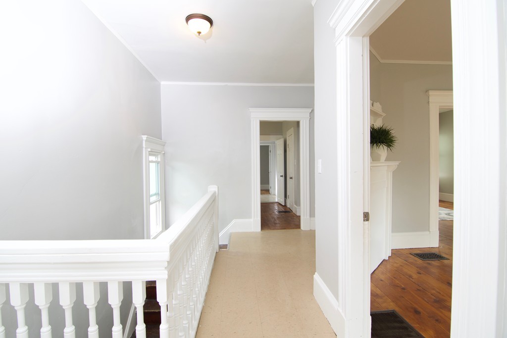 45 Malden Street Springfield, MA 01108 - Photo 10 of 30 a view of a hallway with bedroom and balcony