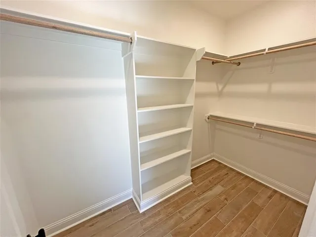 a view of an empty walk in closet