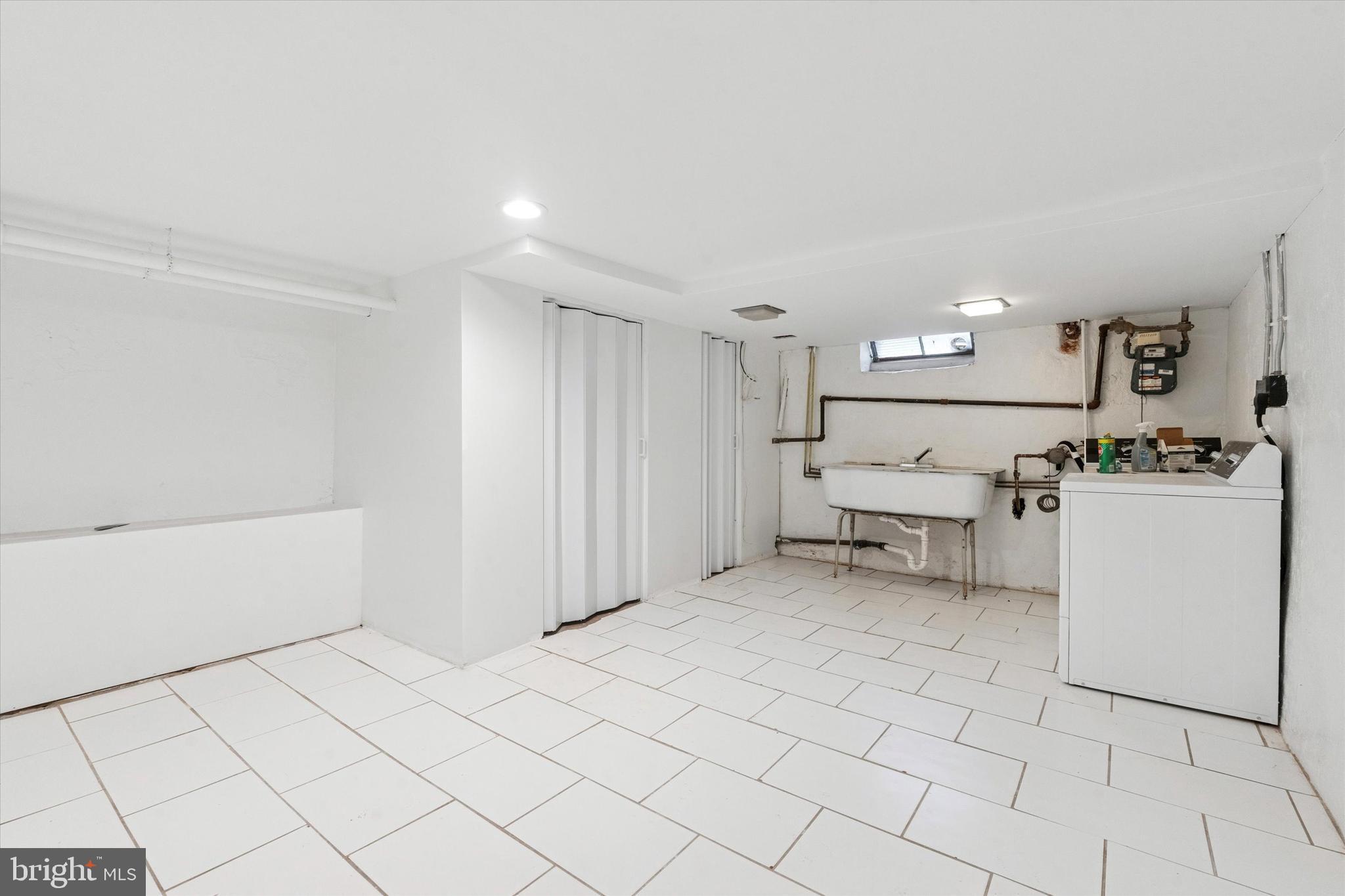4489 Livingston Street Philadelphia, PA 19137 - Photo 21 of 25 a view of kitchen with furniture and white appliances