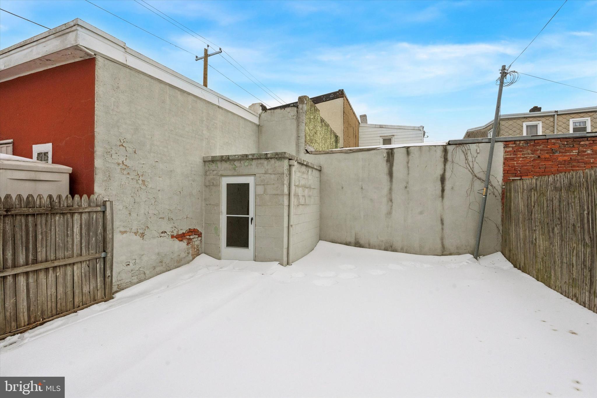 4489 Livingston Street Philadelphia, PA 19137 - Photo 23 of 25 a view of a house with a wooden fence