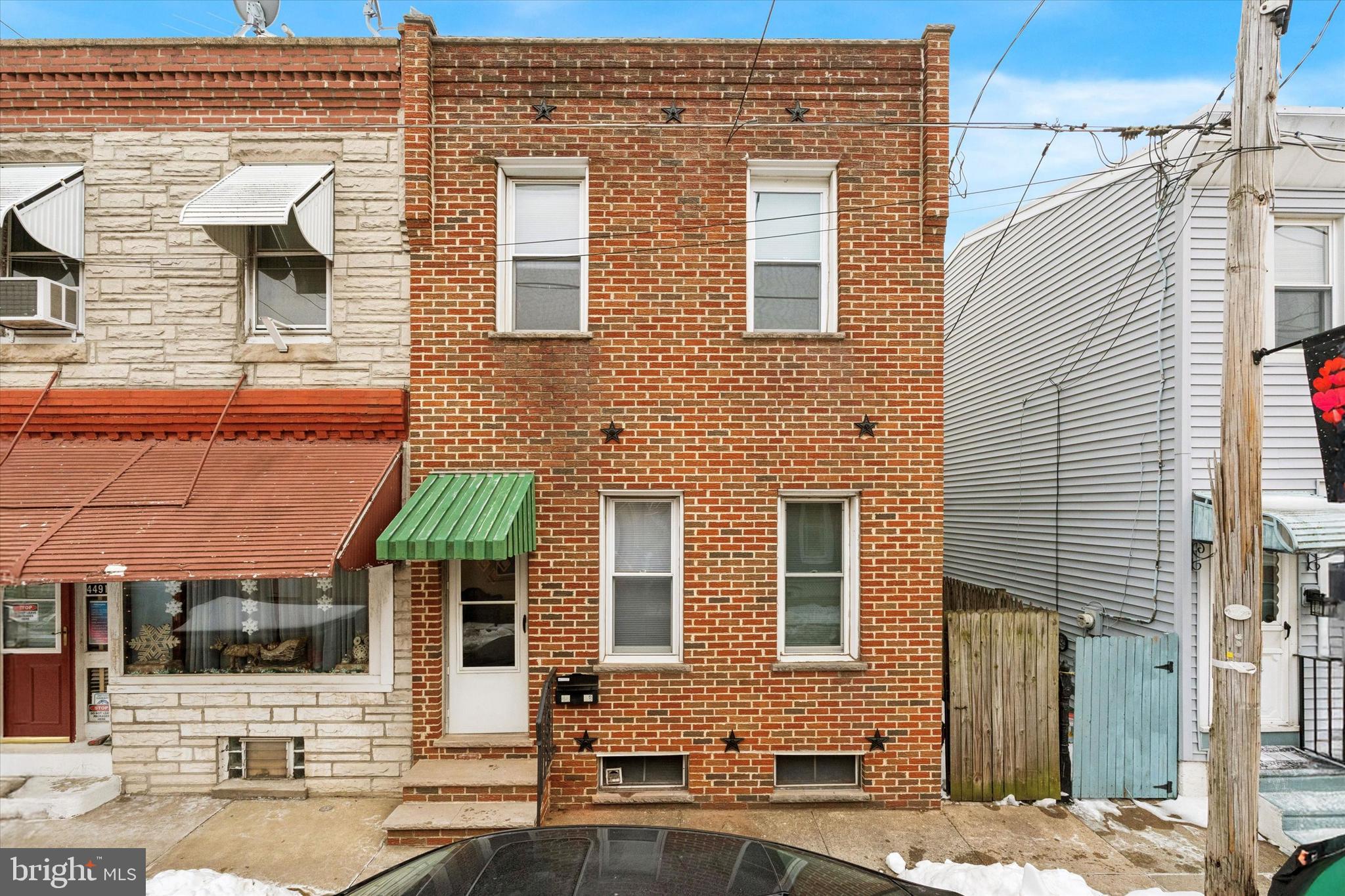 4489 Livingston Street Philadelphia, PA 19137 - Photo 25 of 25 a front view of a house with a street