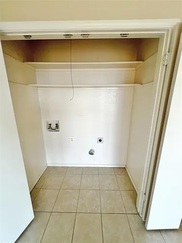 a view of a refrigerator in a kitchen