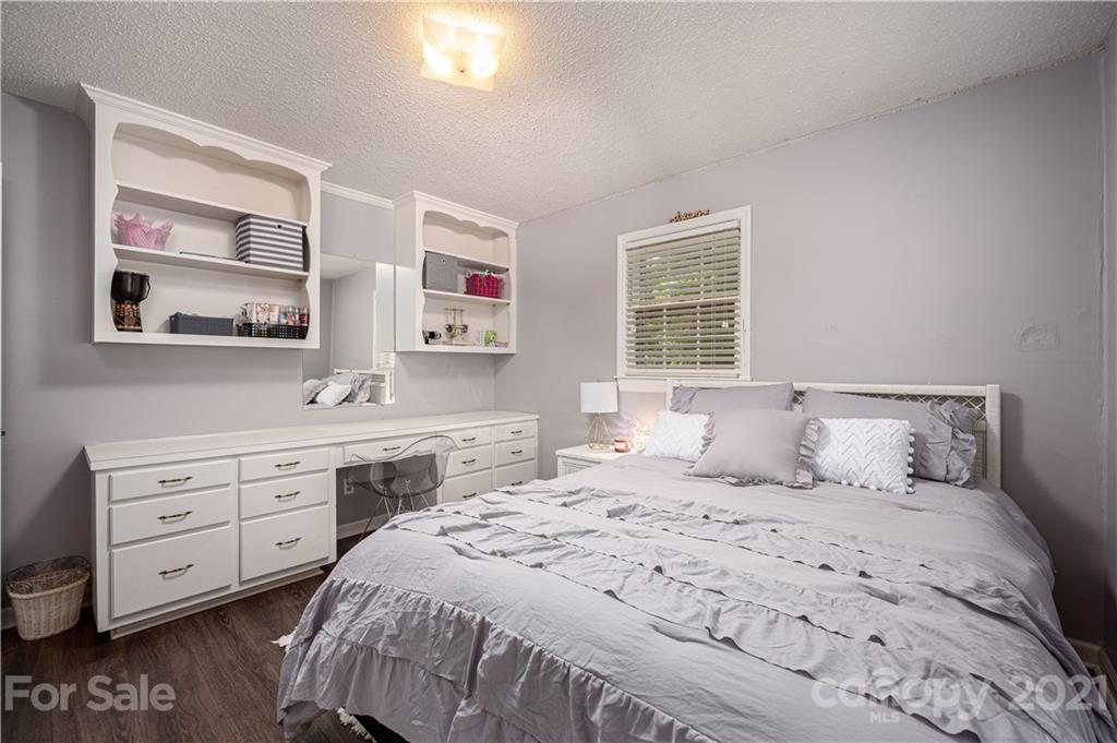 628 Hulls Grove Church Road Vale, NC 28168 - Photo 22 of 40 a bedroom with a bed and a dresser