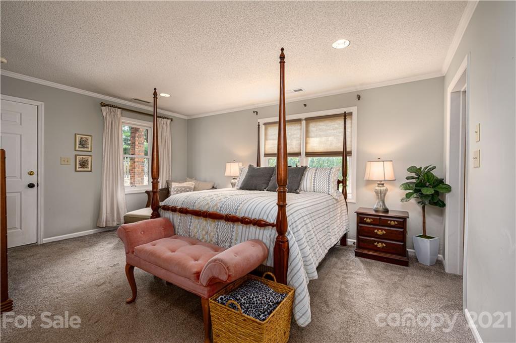 628 Hulls Grove Church Road Vale, NC 28168 - Photo 29 of 40 a bedroom with a bed window and couch