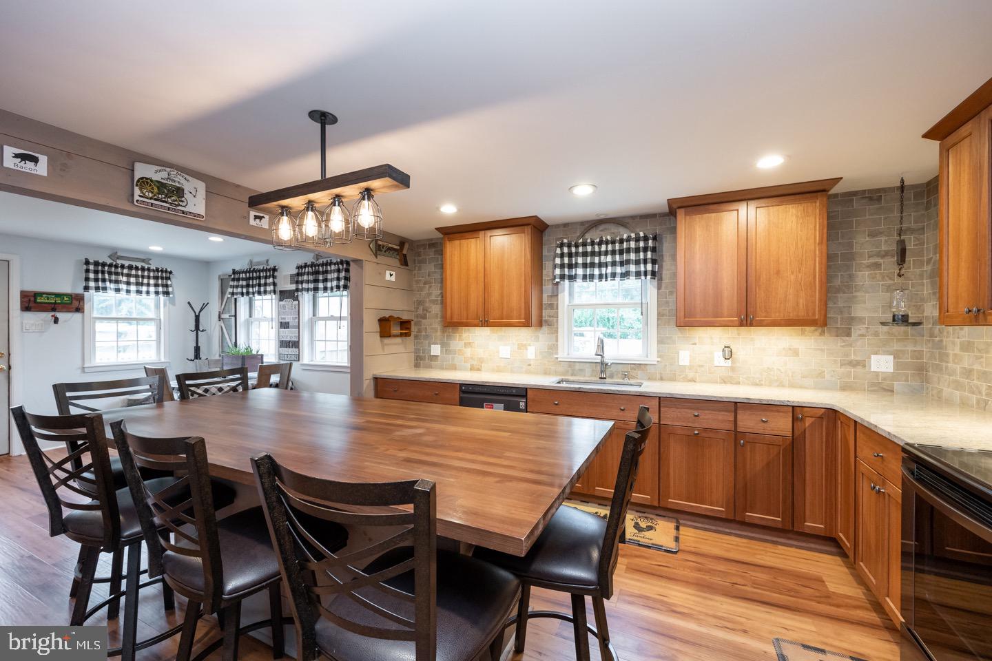 4221 Blair Mill Road Hatboro, PA 19040 - Photo 15 of 42 a large kitchen with a table and chairs in it