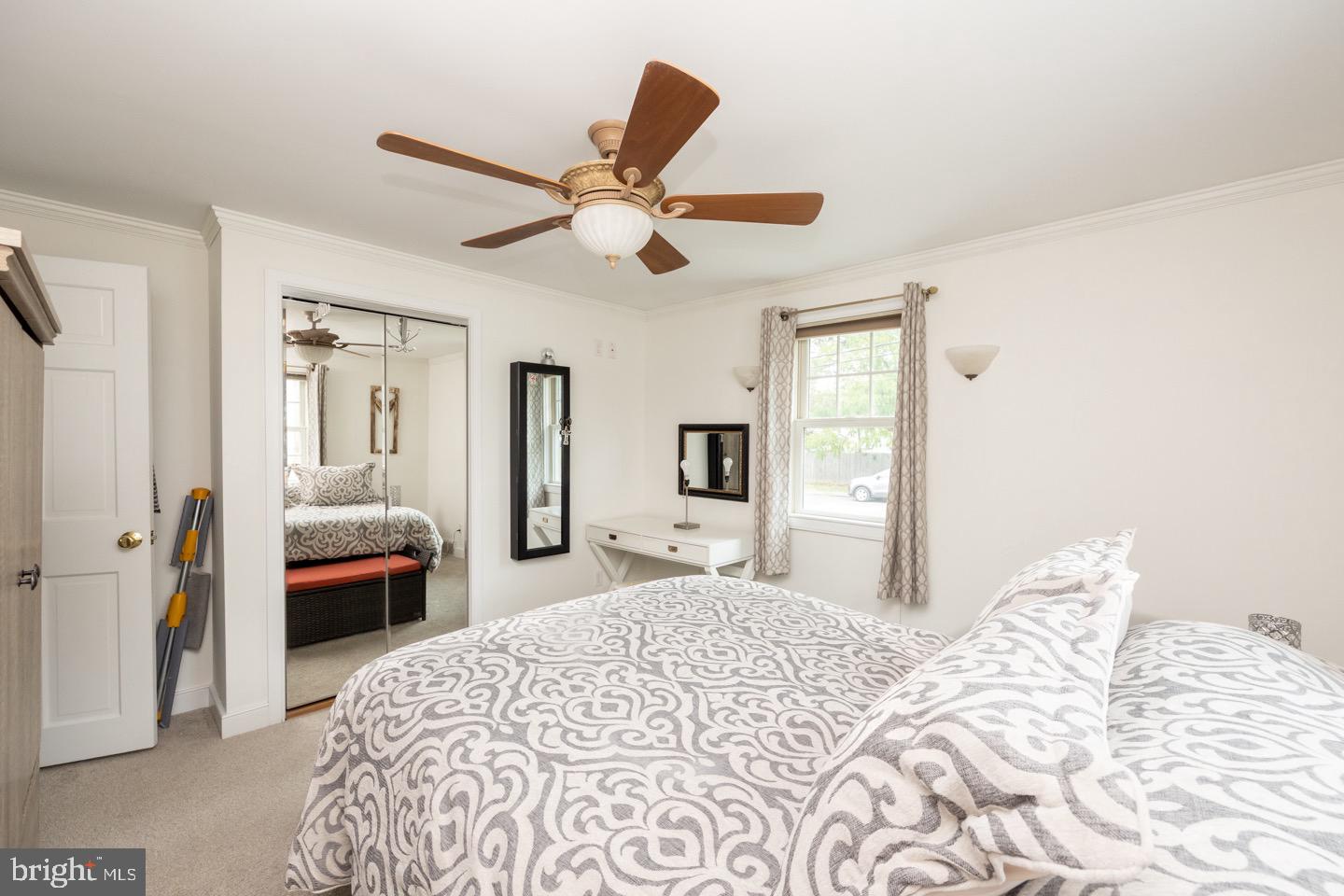 4221 Blair Mill Road Hatboro, PA 19040 - Photo 20 of 42 a bedroom with a bed and a large mirror