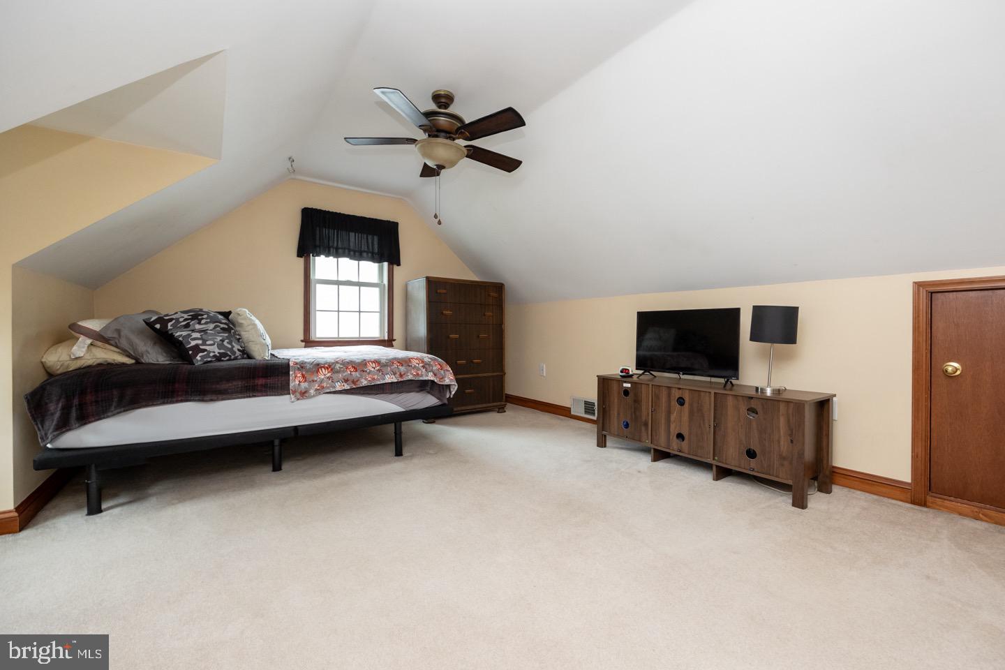 4221 Blair Mill Road Hatboro, PA 19040 - Photo 27 of 42 a living room with furniture and a flat screen tv