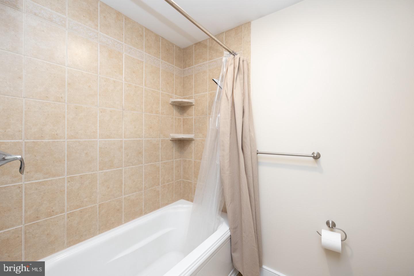 4221 Blair Mill Road Hatboro, PA 19040 - Photo 34 of 42 a bathroom with a shower and a tub