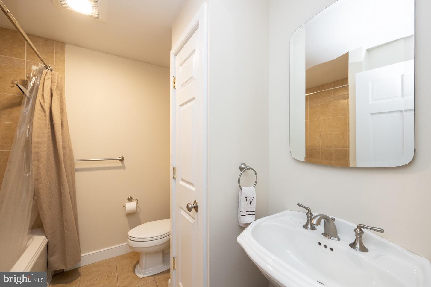 4221 Blair Mill Road Hatboro, PA 19040 - Photo 35 of 42 a bathroom with a sink and a mirror