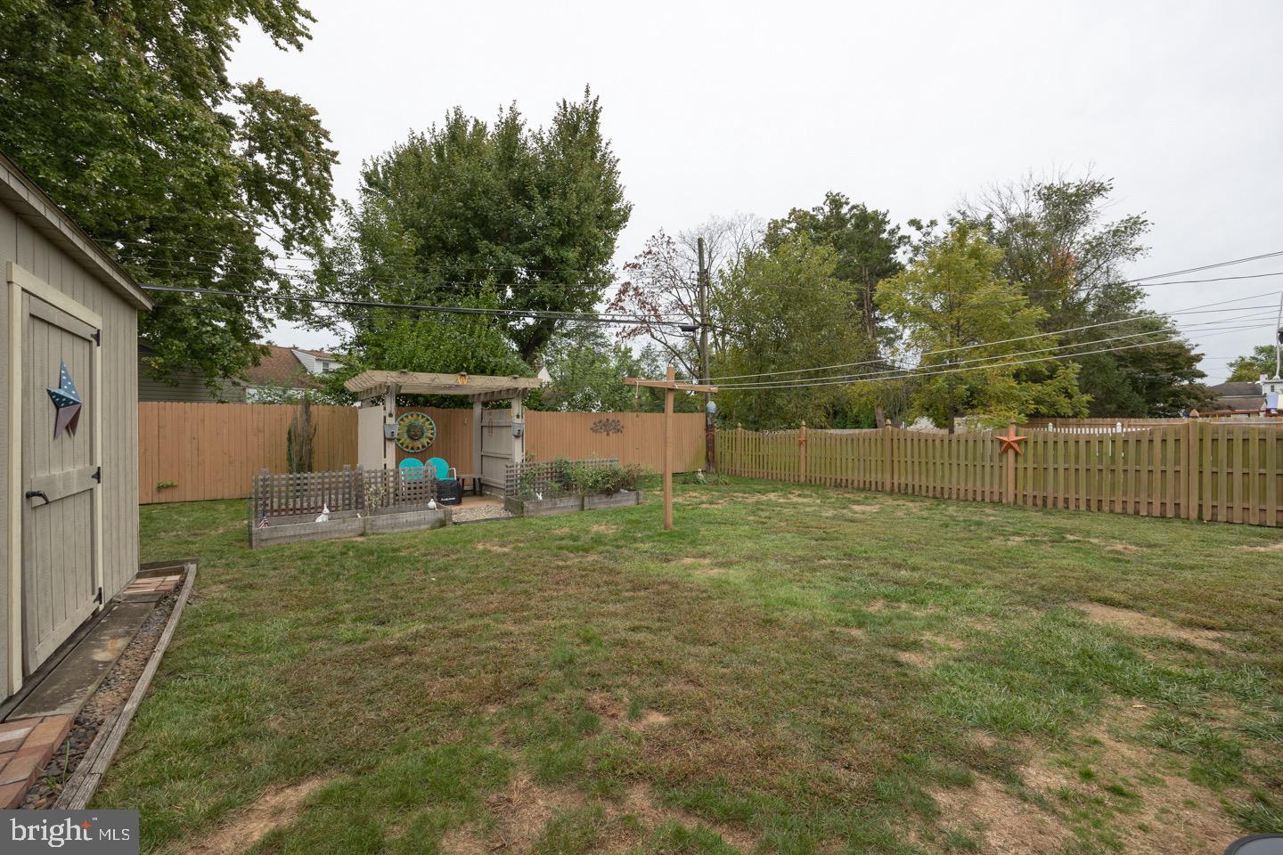 4221 Blair Mill Road Hatboro, PA 19040 - Photo 38 of 42 a backyard of a house with a table and chairs