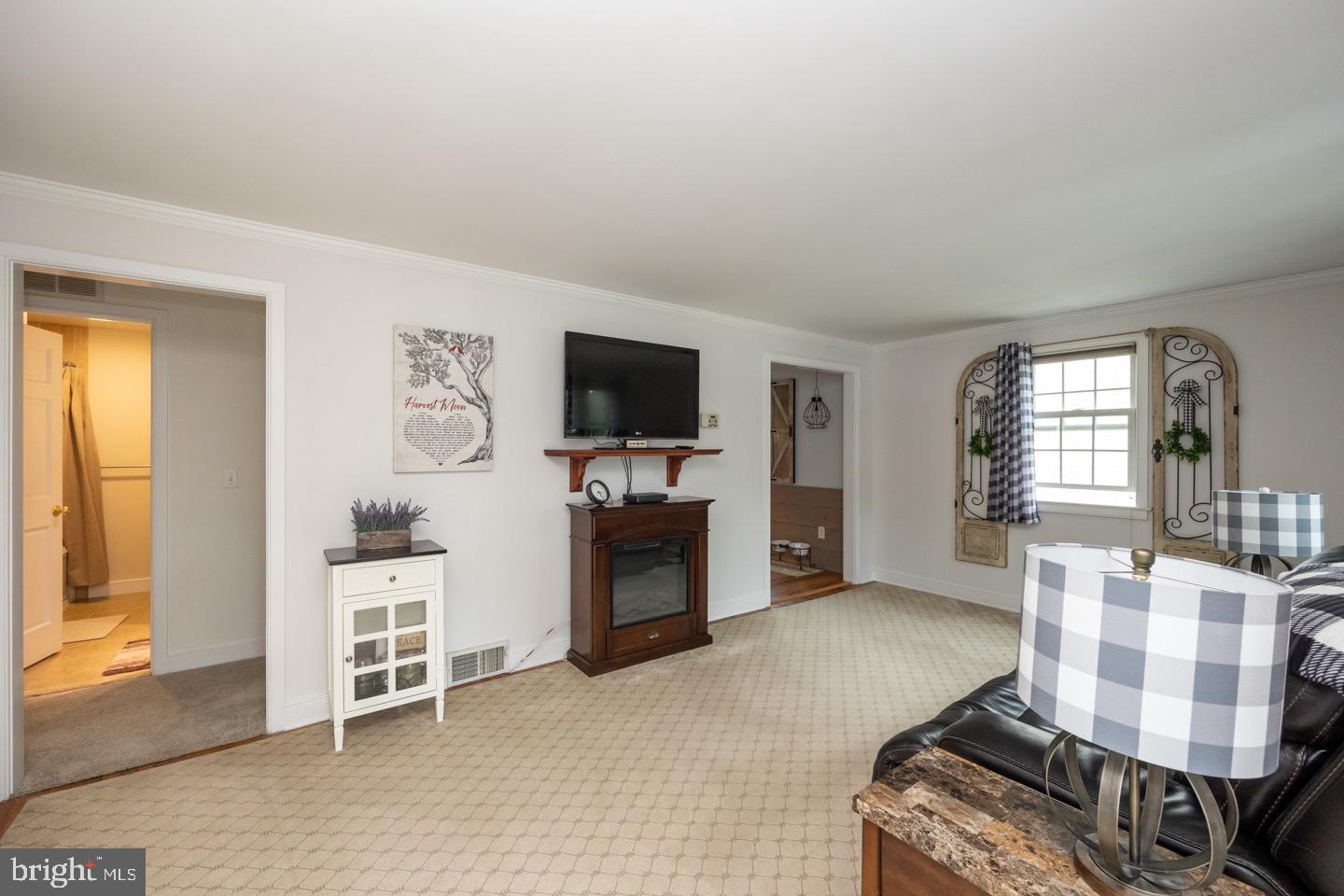4221 Blair Mill Road Hatboro, PA 19040 - Photo 6 of 42 a living room with furniture and a flat screen tv
