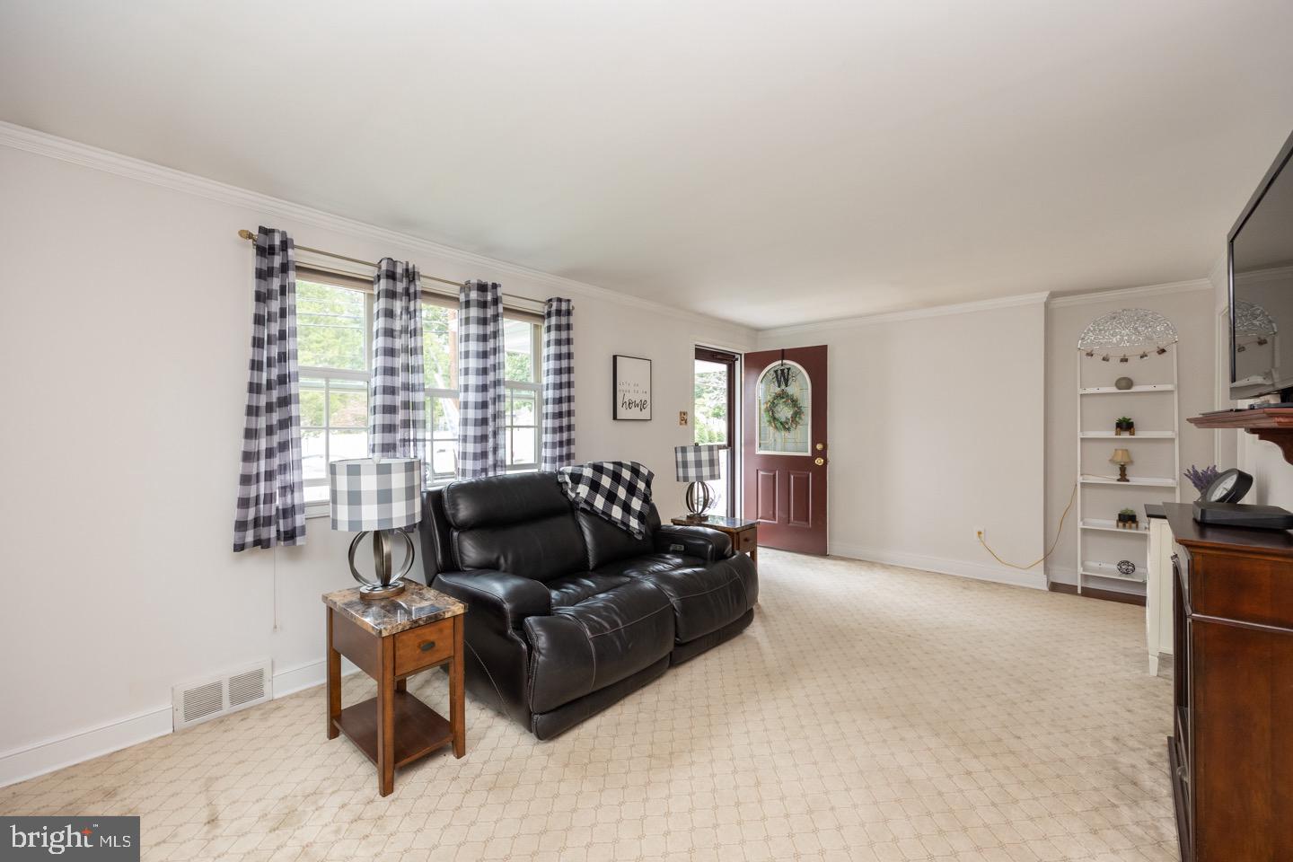 4221 Blair Mill Road Hatboro, PA 19040 - Photo 8 of 42 a living room with furniture and a large window
