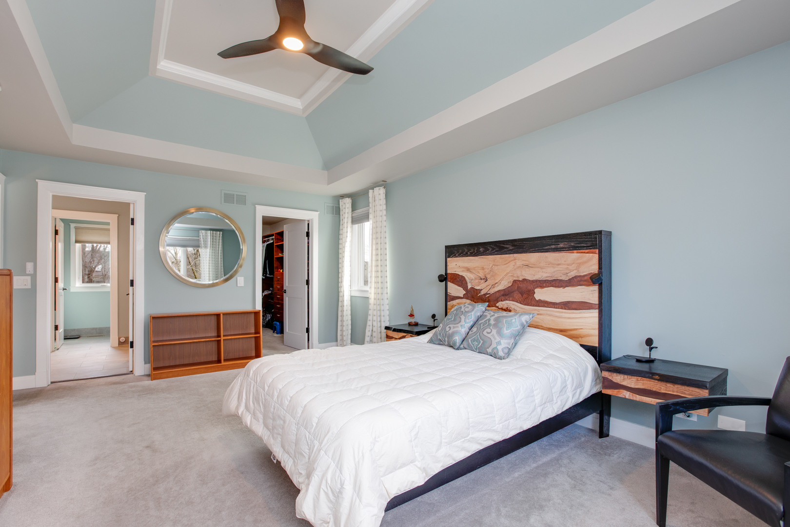 828 Sanctuary Lane Naperville, IL 60540 - Photo 13 of 28 a bedroom with a bed and a chandelier