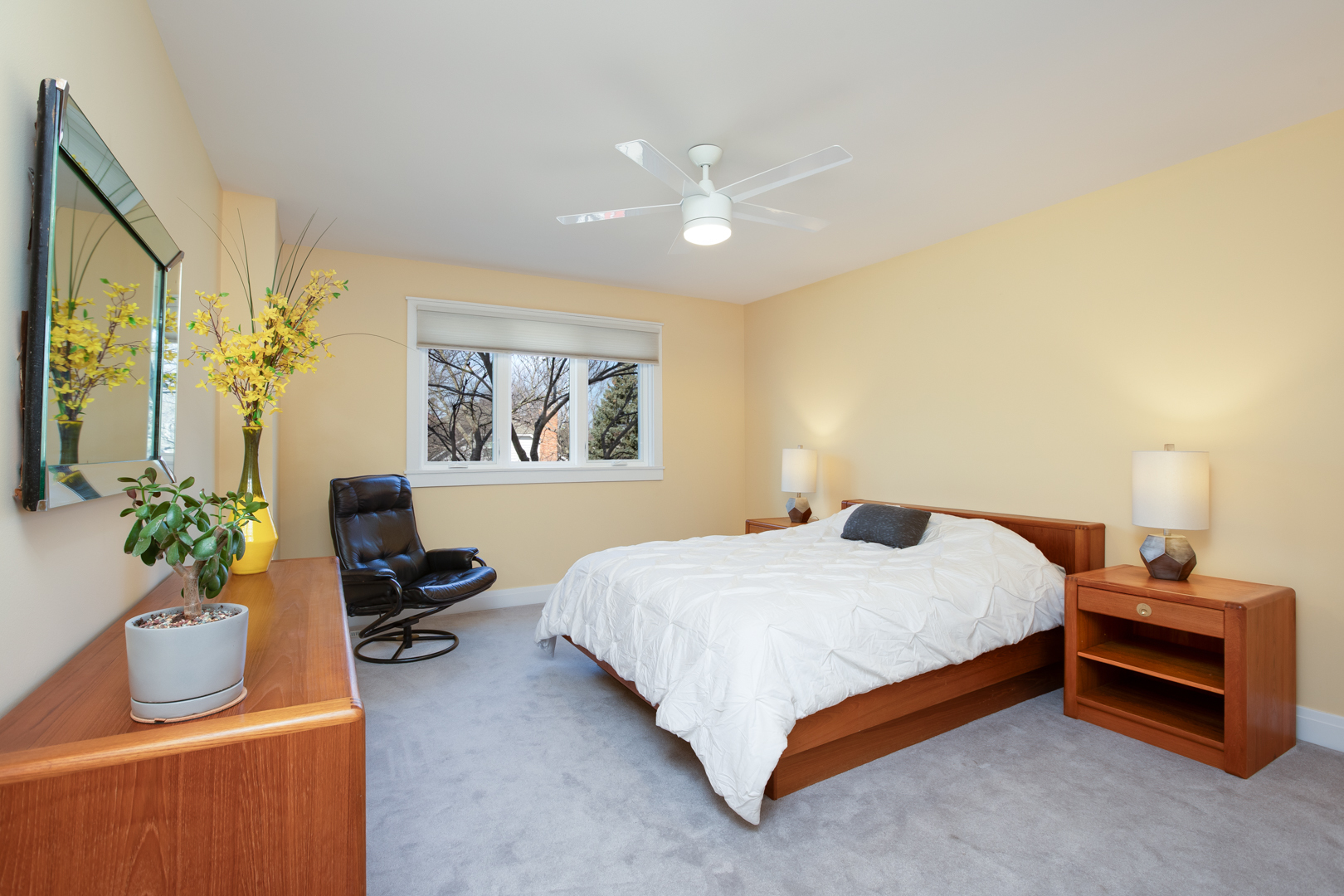 828 Sanctuary Lane Naperville, IL 60540 - Photo 17 of 28 a bedroom with a bed and a chandelier