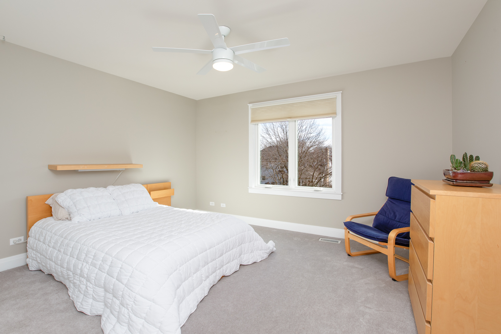 828 Sanctuary Lane Naperville, IL 60540 - Photo 18 of 28 a bedroom with a bed and chair