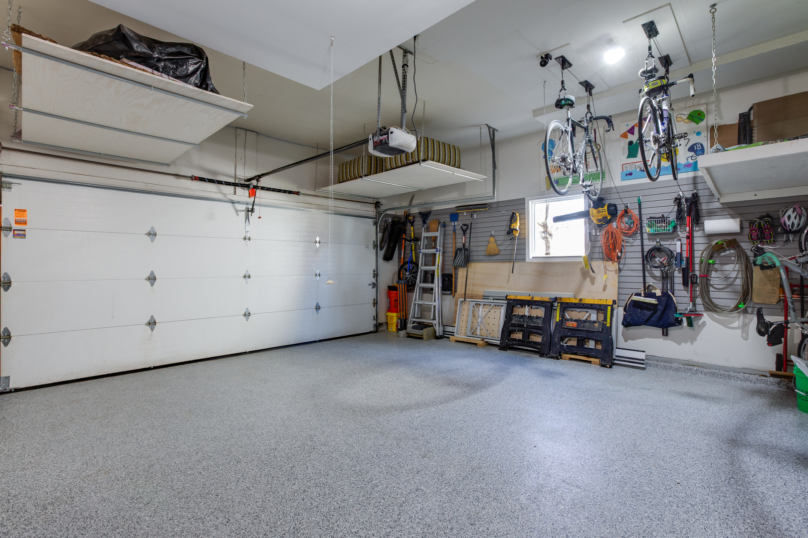 828 Sanctuary Lane Naperville, IL 60540 - Photo 24 of 28 a view of a room with lots of gym equipment
