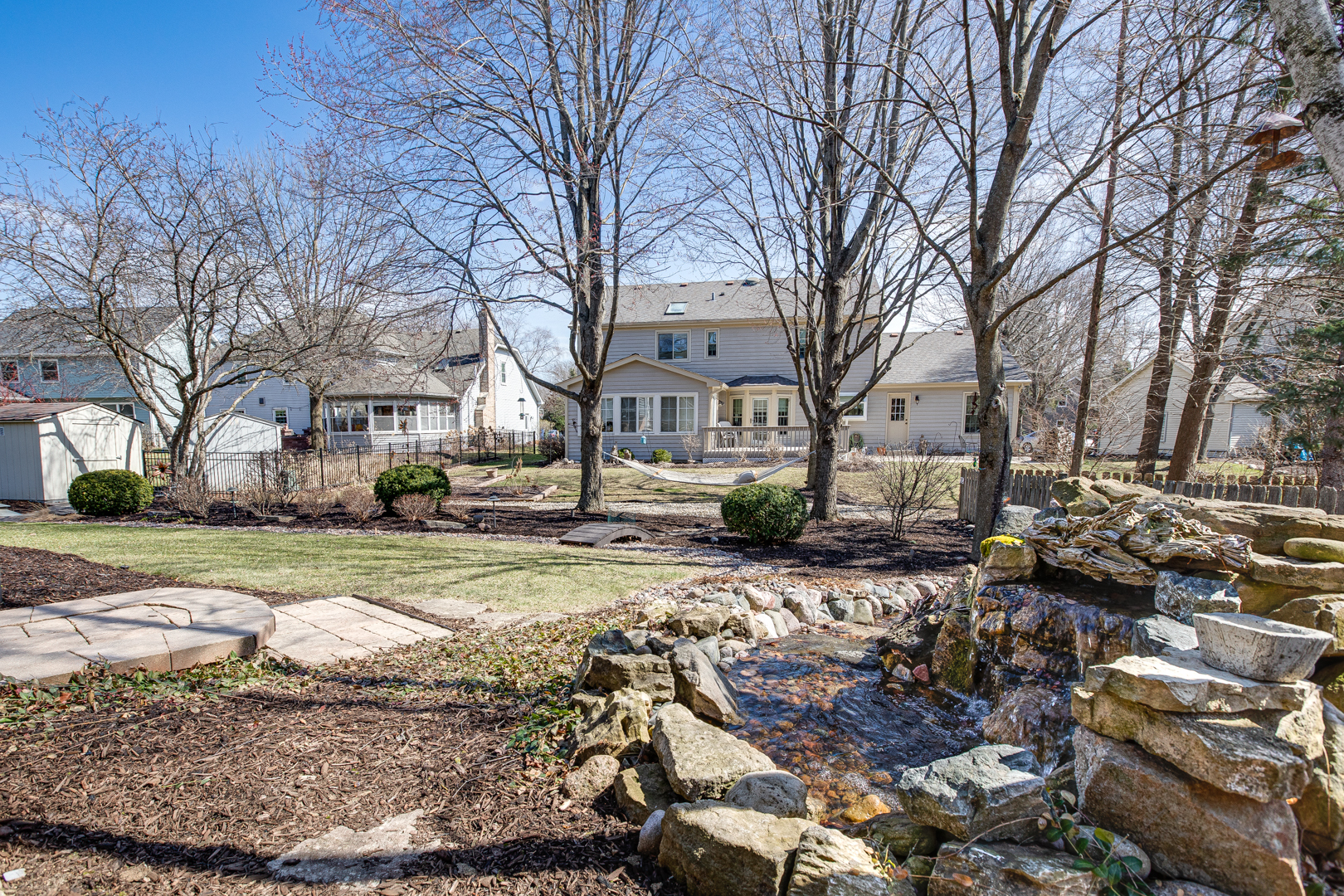 828 Sanctuary Lane Naperville, IL 60540 - Photo 26 of 28 a view of a yard with a large tree