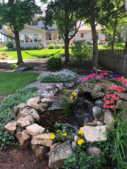828 Sanctuary Lane Naperville, IL 60540 - Photo 28 of 28 a view of a house with a big yard and large trees