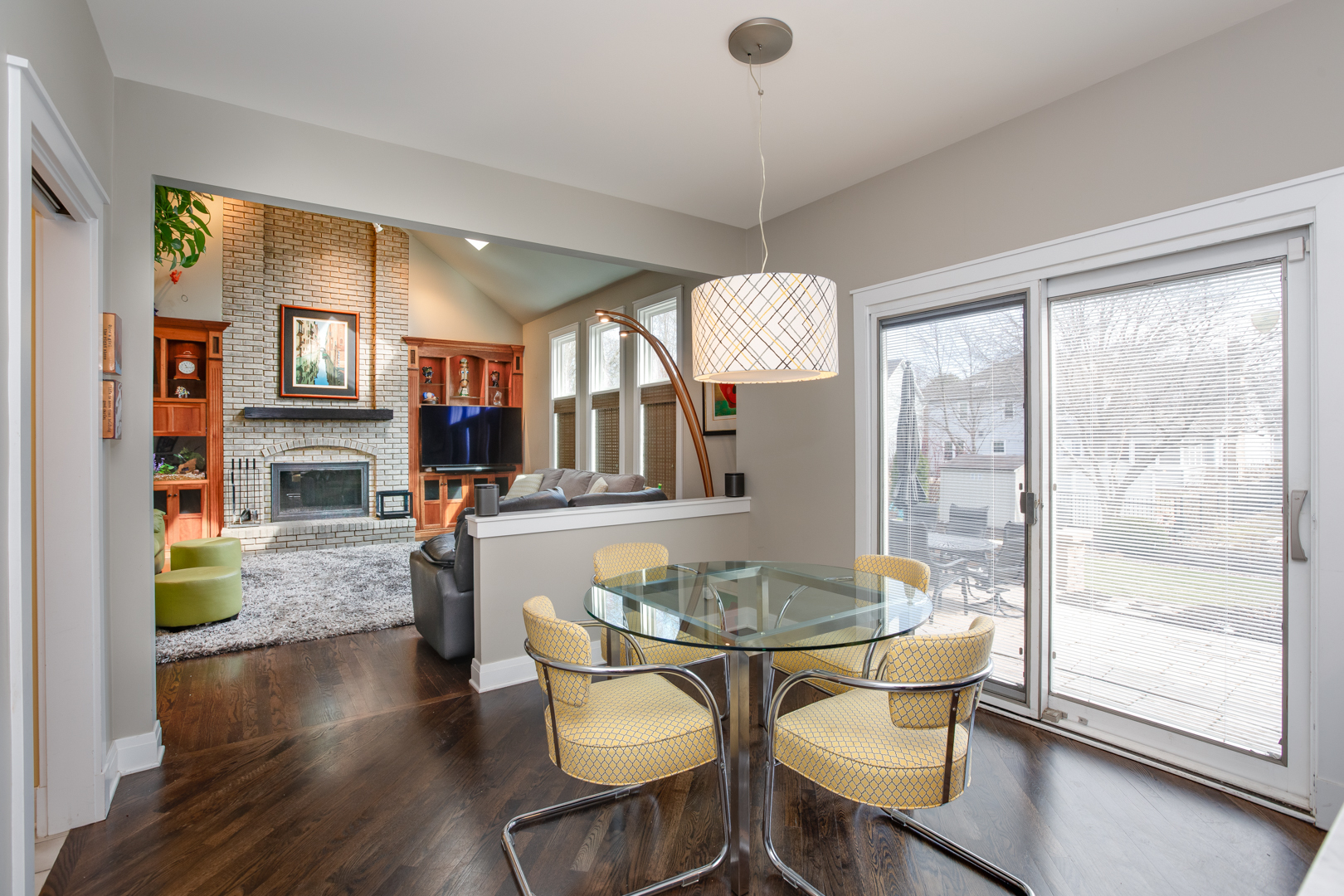 828 Sanctuary Lane Naperville, IL 60540 - Photo 6 of 28 a view of a dining room with furniture window and wooden floor