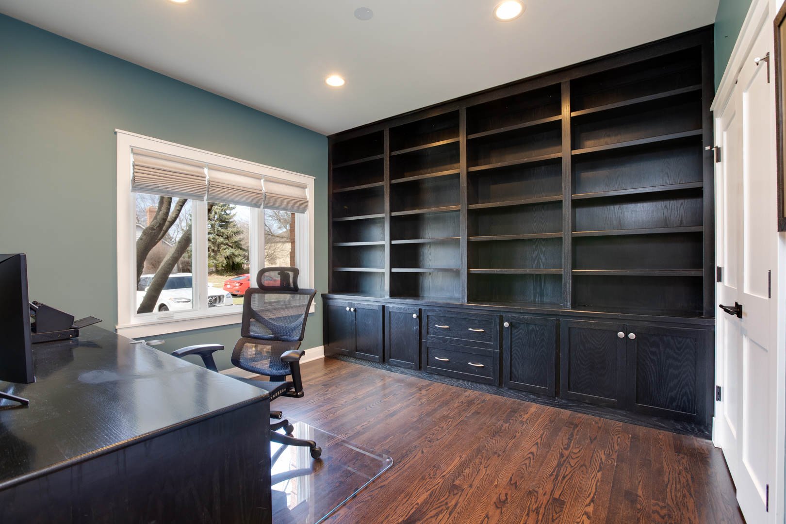 828 Sanctuary Lane Naperville, IL 60540 - Photo 10 of 28 a view of a workspace with furniture and a window