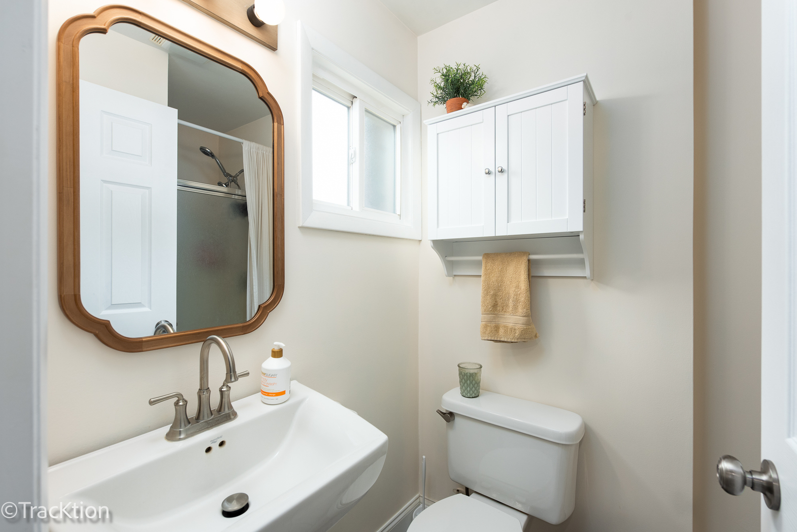 10S450 Ruth Drive Lemont, IL 60439 - Photo 14 of 22 a bathroom with a sink toilet and mirror