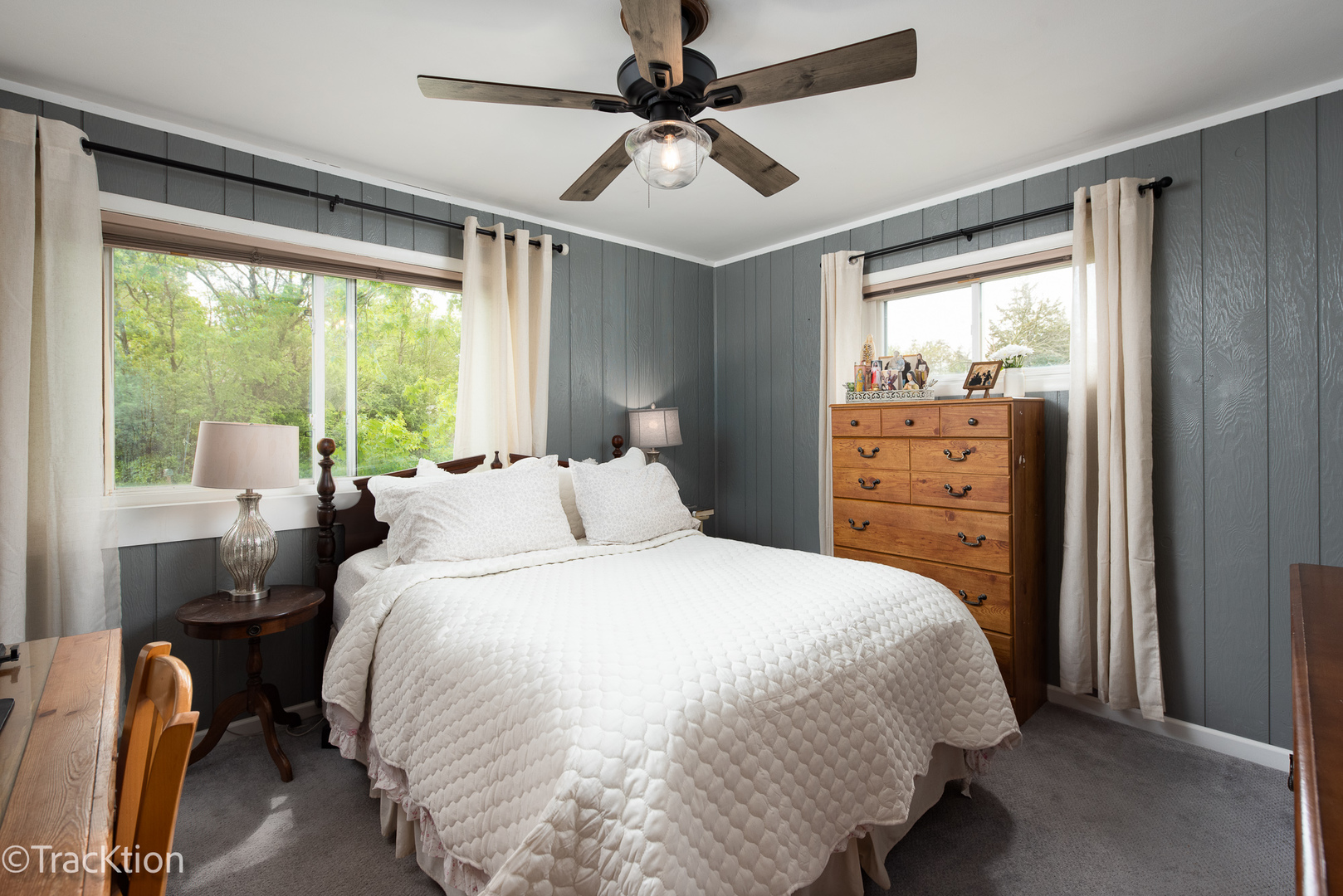 10S450 Ruth Drive Lemont, IL 60439 - Photo 15 of 22 a bedroom with a bed and a chandelier